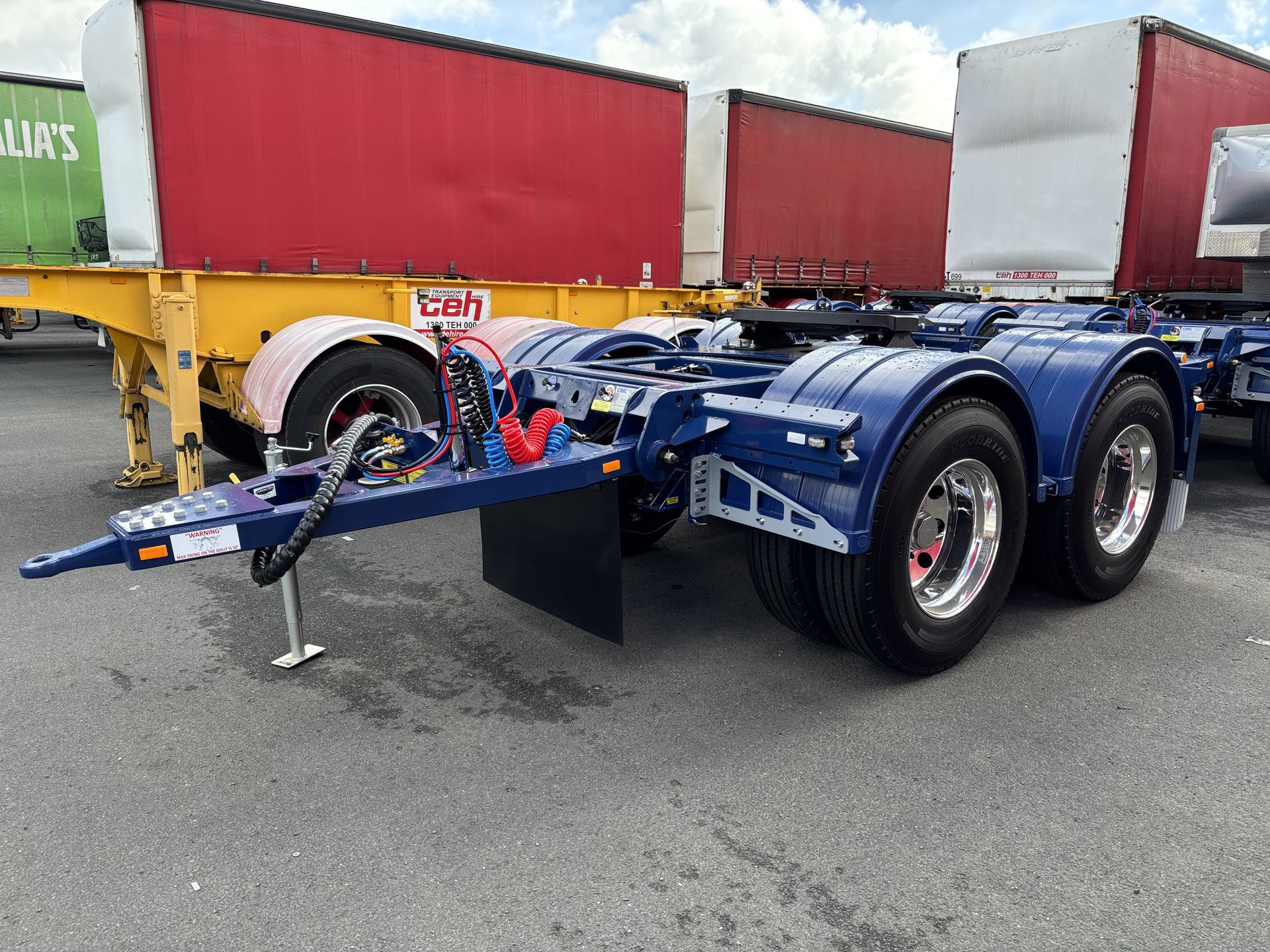 TEH tandem converter dolly with drawbar and fifth wheel